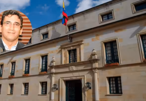 Photo composition with a portrait of Ambassador Milton Rengifo with the Colombian Ministry of Foreign Affairs headquarters in the background. Photo: Orinoco Tribune.