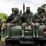 M23 rebels prepared to leave after a ceremony to mark the withdrawal from their positions in Kibumba, in eastern DR Congo, in December 23, 2022. Photo: AP.