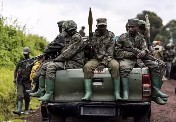 M23 rebels prepared to leave after a ceremony to mark the withdrawal from their positions in Kibumba, in eastern DR Congo, in December 23, 2022. Photo: AP.