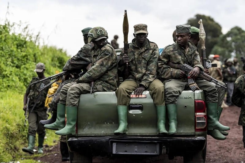 M23 rebels prepared to leave after a ceremony to mark the withdrawal from their positions in Kibumba, in eastern DR Congo, in December 23, 2022. Photo: AP.