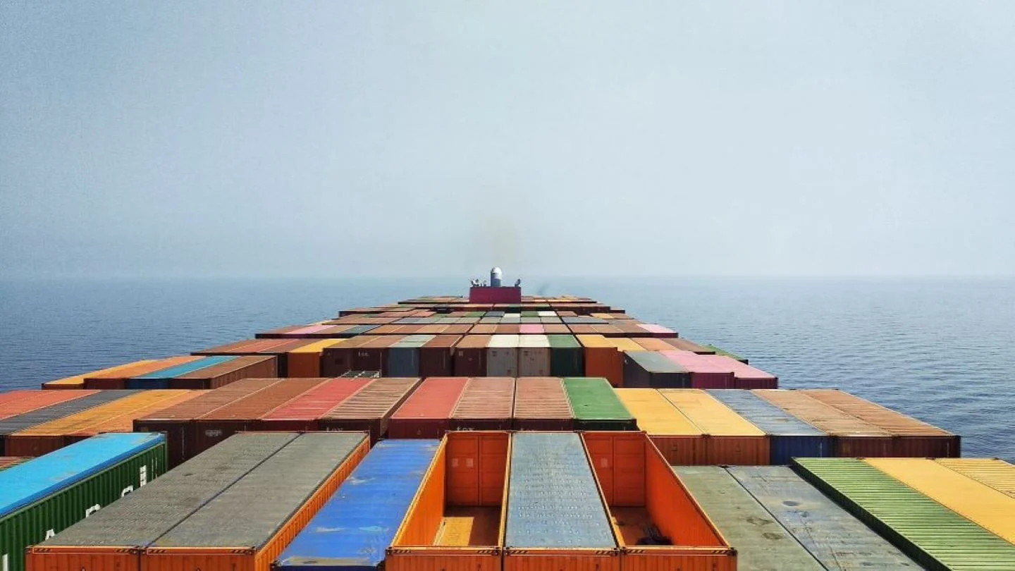 A view of the upper deck of a mega container transport ship. Photo: Rinson Chory/Unsplash.