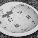 A Wikipedia printed logo on a grass field. Photo: Moheen/Wikipedia/CC BY-SA 2.0.