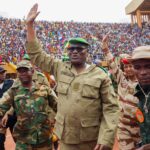 Mohamed Toumba, one of the leading figures in Niger's military government, at a massive rally with supporters. Photo: Balima Boreima/Anadolu Agency via Getty Images.