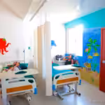 After the coup attempt was defeated, the government intensified its public works programs. Roads and buildings were repaired and new hospitals, schools, renewable energy and housing projects followed. Here is the new hospital in San Juan del Sur, Rivas. Photo: Enrique Oporta/LifeInNica.com.