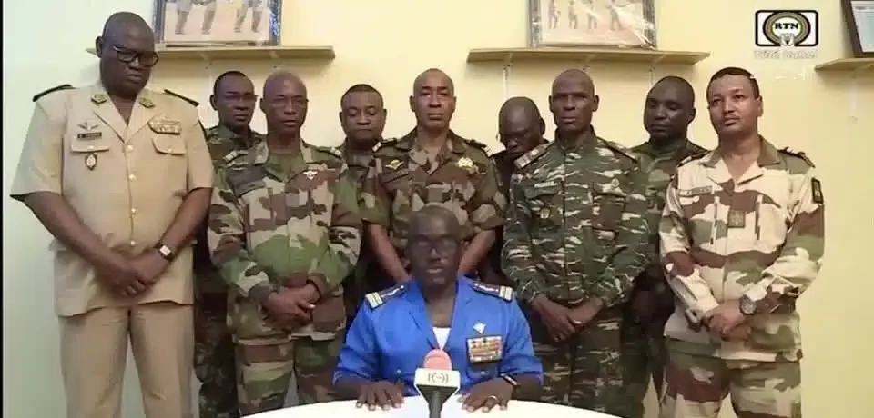 Niger Army spokesman Colonel Major Amadou Adramane speaks during an appearance on national television, after President Mohamed Bazoum was held in the presidential palace, in Niamey, Niger, July 26, 2023 in this still image taken from video. Photo: ORTN/via Reuters TV/Handout via Reuters.