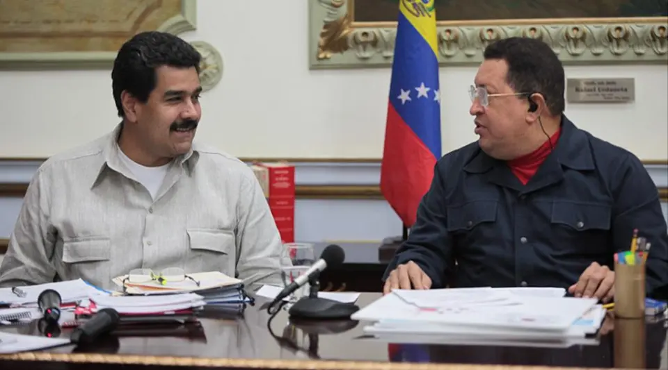 President Nicolás Maduro and Hugo Chávez. Photo: Peoples Dispatch/File photo.