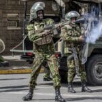 Kenyan police teargas protestors. Photo: Luis Tato/AFP.