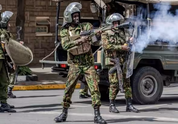 Kenyan police teargas protestors. Photo: Luis Tato/AFP.