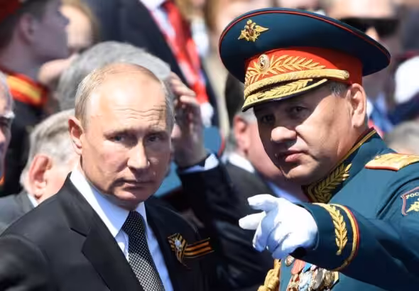 Russian President Vladimir Putin with Sergei Shoigu, his defense minister during the 2021 Victory Day Parade. Photo: Getty Images/File photo.