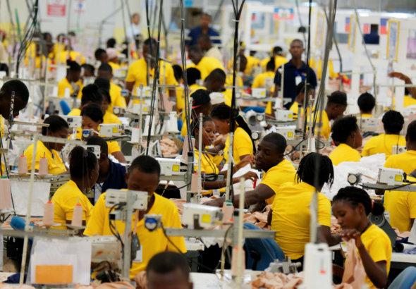 Garment employees are seen working in the sewing section of a clothing plant in Haiti. Photo: Marcel Crozet/ILO.