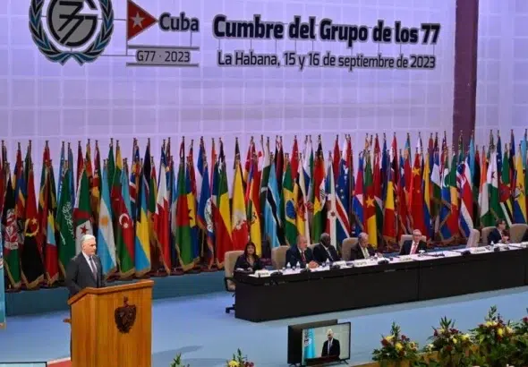 Cuban President Miguel Diaz Canel (left) speaks during the inaugural session of the G77+China Summit at the Convention Palace in Havana on September 15, 2023. Photo: Adalberto Roque, AFP.