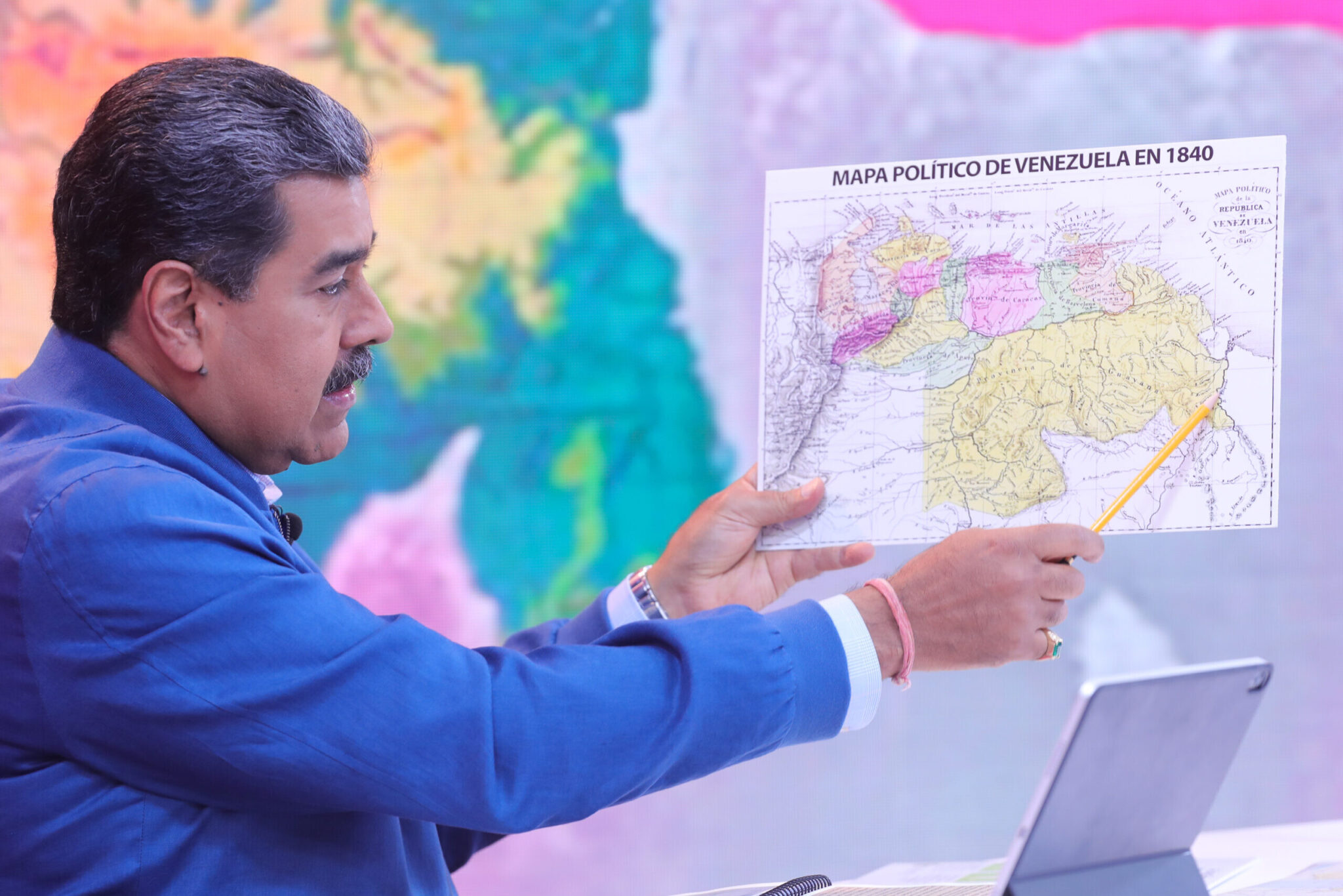 Venezuelan President Nicolas Maduro pointing at the Essequibo territory on an old map of Venezuela during his program Con Maduro+. Photo: Presidential Press.