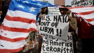 Image from a US protest against US/NATO’s actions in Libya. Photo: Al Mayadeen English.
