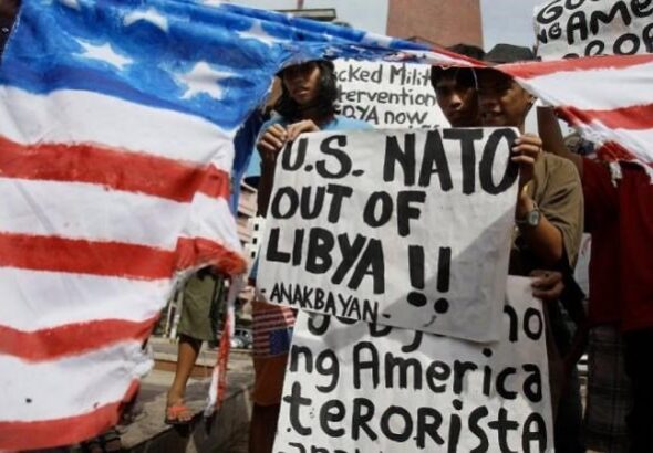 Image from a US protest against US/NATO’s actions in Libya. Photo: Al Mayadeen English.