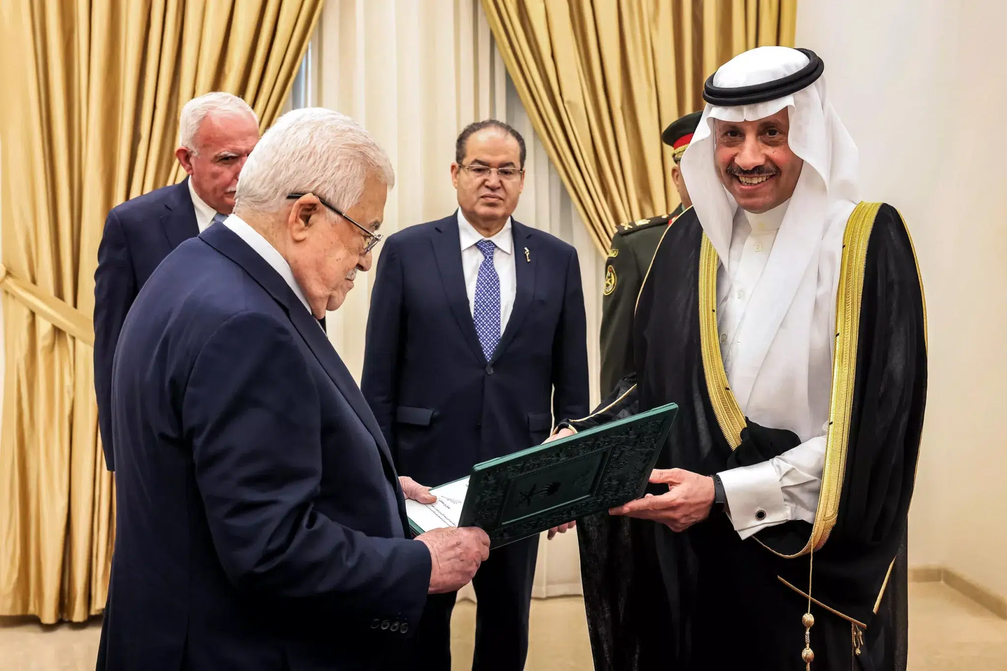 Palestinian President Mahmud Abbas (left) receiving the credentials of Nayef al-Sudairi(right), Saudi Arabia's non-resident ambassador to Palestine. Photo: Thaer Ghanaim/PPO/AFP.