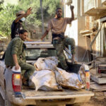 Bodies of the flooding victims are transported in Derna, Libya, Wednesday, Sept.13, 2023. Photo: Yousef Murad/AP Photo.