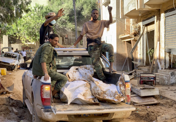 Bodies of the flooding victims are transported in Derna, Libya, Wednesday, Sept.13, 2023. Photo: Yousef Murad/AP Photo.