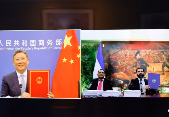 Photo composition of Chinese and Nicaraguan government representatives attending the signing of the free trade agreement between the two countries. Photo: Canal 2.