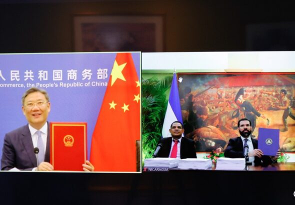 Photo composition of Chinese and Nicaraguan government representatives attending the signing of the free trade agreement between the two countries. Photo: Canal 2.