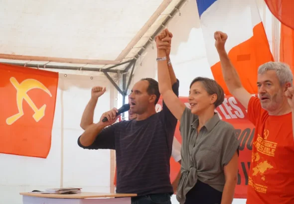 Marxist speakers raising their fist during their participation at the Fête de l’Humanité in Paris, France on September 2023. Photo: Platform News.