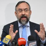 The head of the Venezuelan opposition's self-styled National Primaries Commission, Jesús María Casal, at a press conference. Photo: EFE.