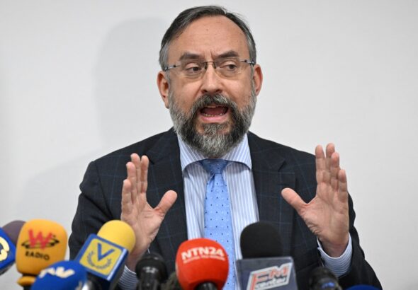 The head of the Venezuelan opposition's self-styled National Primaries Commission, Jesús María Casal, at a press conference. Photo: EFE.