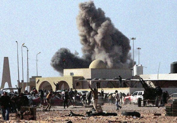 A large explosion is seen on the outskirts of Benghazi after a fighter jet was shot down over Benghazi in eastern Libya. Photo: AP.