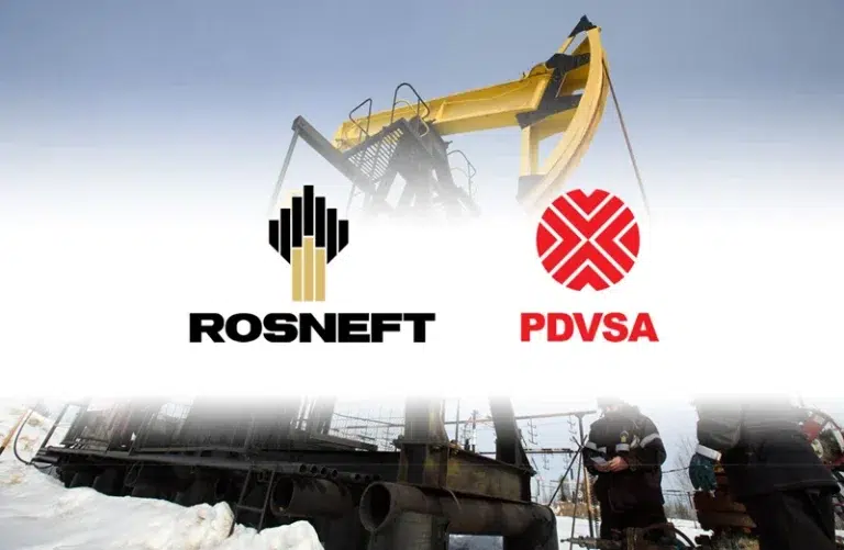 Rosneft and PDVSA logos with an oil rig in the background. File photo.