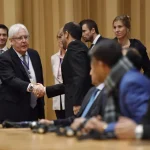 UN Special Envoy to Yemen Martin Griffiths shakes hands with Yemeni delegates during the first peace talks held in December 2018 in Stockholm, Sweden. Photo: Stina St Jernkvist/AFP/Getty Images.