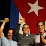 The Cuban Five, photographed in front of the Cuban flag. Photo: Resumen Latinoamericano-English/File photo.