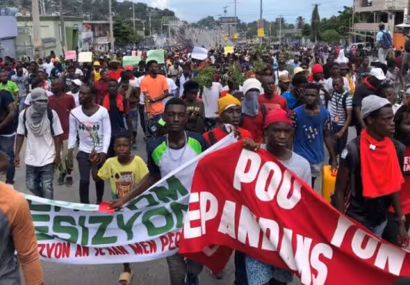 Haitians protest austerity and an illegitimate government. Photo: Etant Dupain/Twitter via Black Agenda Report.