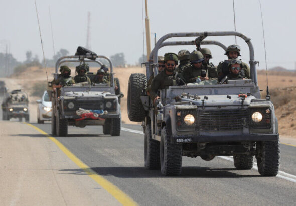 Israeli soldiers drive along the border with Gaza near the Southern city of Ofakim, October 11, 2023. Photo: Abir sultan/Efe via Zuma Press/APA images.