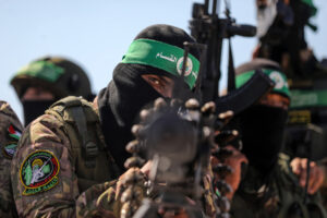 Palestinian fighters with the Qassam Brigades, the military wing of Hamas, pictured in Gaza in July. Photo: Majdi Fathi/APA.