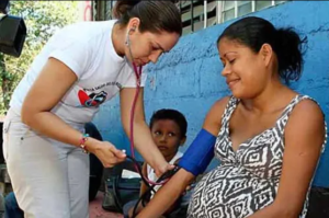 “Brigadistas are part of the birthing plan of pregnant women, particularly of those at risk. Unlike in the neoliberal years, most women now give birth in hospitals.” A pregnant Nicaraguan woman receives a medical checkup from a brigadista. Photo: Revista De Frente/File photo.
