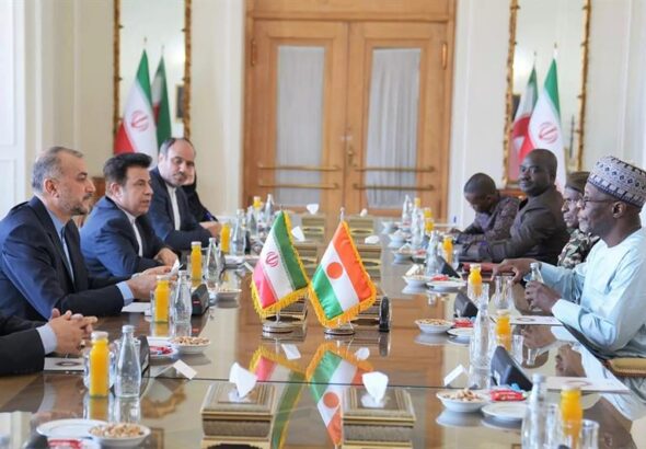 Hossein Amir Abdollahian (left) and his team during a meeting with Niger s Bakary Yaou Sangare (right), who was made foreign minister after the coup, in Tehran. Photo: AFP.