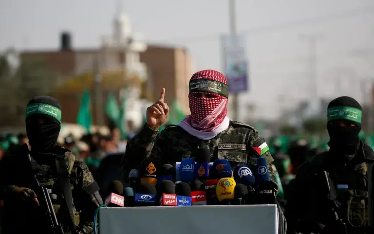 A spokesman for the Al-Qassam Brigades talks to the press in the town of Khan Younis, southern Gaza Strip, November 11, 2019. Photo: AP/Hatem Moussa.