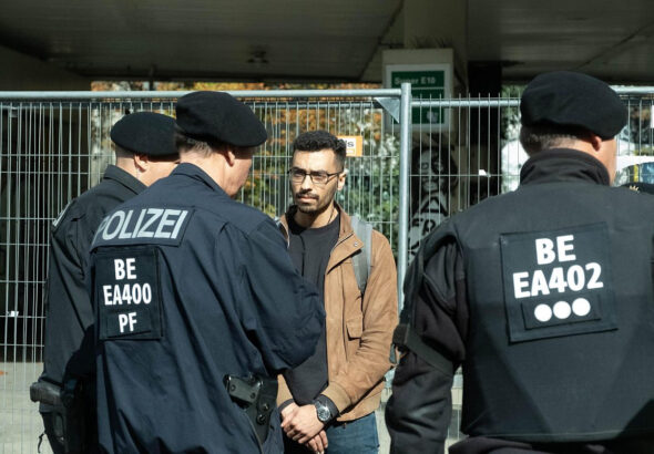 Zaid Abdulnasser, a Palestinian refugee from Syria living in Berlin, and activist with Samidoun, being accosted by German police on October 1, 2023. Photo: Samidoun.