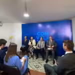 Venezuelan opposition politician María Corina Machado seated next to her advisors, speaking in front of foreign diplomats in Caracas on Wednesday, October 25, 2023. Photo: X/MariaCorinaYA.