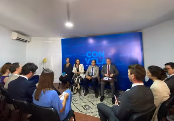 Venezuelan opposition politician María Corina Machado seated next to her advisors, speaking in front of foreign diplomats in Caracas on Wednesday, October 25, 2023. Photo: X/MariaCorinaYA.