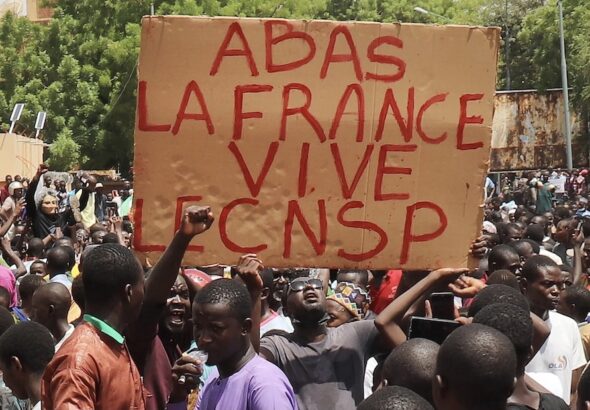 Protesters with sign that reads: Down with France, long live the CNSP (National Council for the Safeguard of the Homeland). Photo: Peoples Dispatch/file photo.