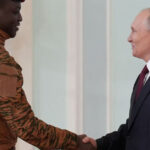 Russia's President Vladimir Putin shakes hands with Burkina Faso's interim President Ibrahim Traore during a meeting following the Russia-Africa summit in Saint Petersburg, Russia, July 29, 2023. Photo: Sputnik/Alexei Danichev