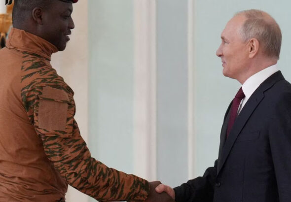 Russia's President Vladimir Putin shakes hands with Burkina Faso's interim President Ibrahim Traore during a meeting following the Russia-Africa summit in Saint Petersburg, Russia, July 29, 2023. Photo: Sputnik/Alexei Danichev