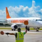 Ground staff directs a Conviasa plane at Simón Bolívar International Airport, Venezuela. File photo.