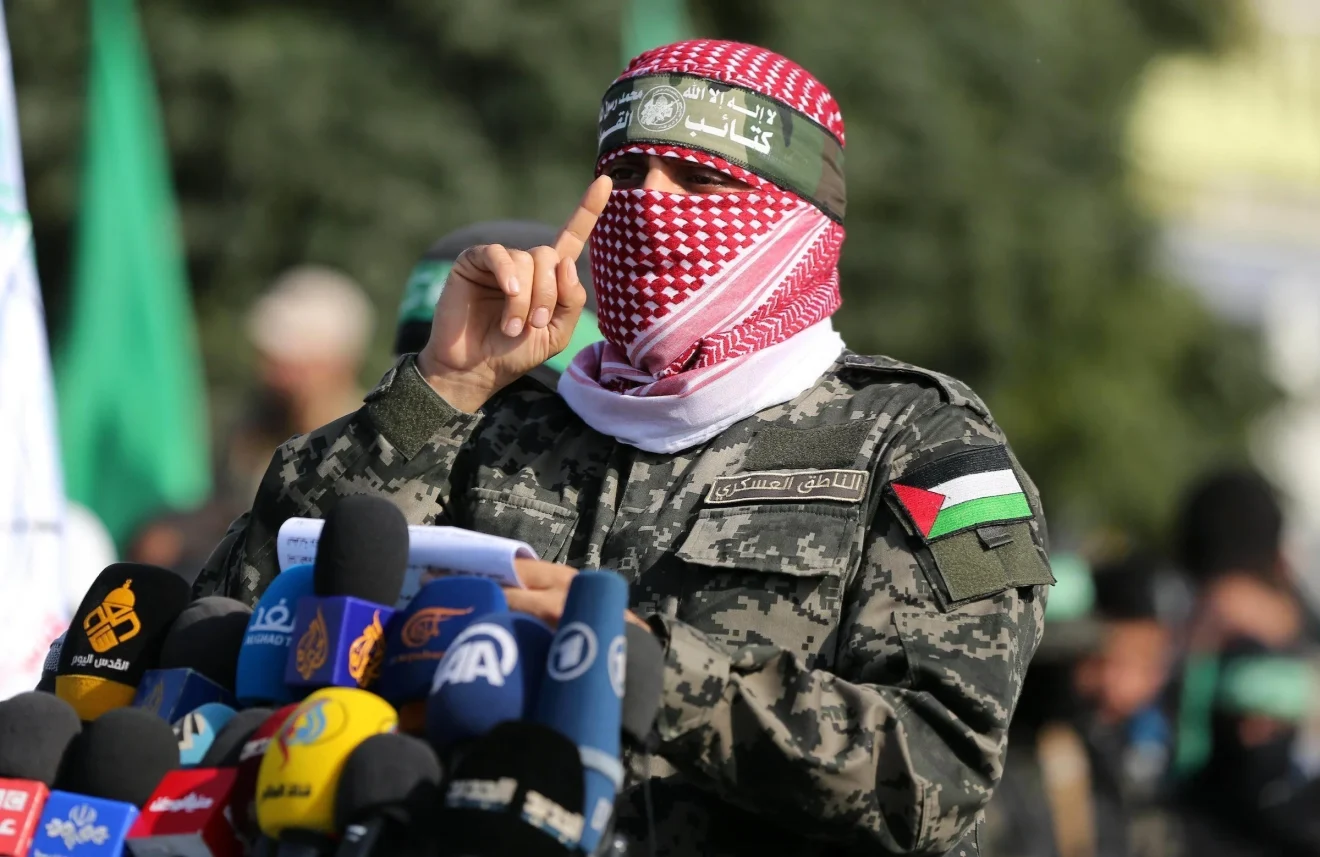 Al-Qassam Brigades spokesman, Abu Obeida, giving statements to the press on October 7, 2023  Photo: Al-Mayadeeen.