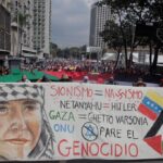 Banner in a massive Caracas demonstration in favor of the Palestine people. Photo: Ciudad CCS/Javier Blanco.