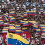 Crowds of the Venezuelan military waving national flags. Photo: Sputnik.