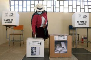 A person casts their vote during the 2021 Presidential Elections in Cuenca, Ecuador. Photo: Cristina Vega Rhor/AFP/Getty Images/File photo.