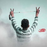 A Palestinian child holds a slingshot.  Photo: Al-Carmel/File photo.