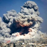 Smoke and fire engulf Gaza City following an Israeli airstrike on the densely populated urban area. Photo: Hatem Moussa/AP.