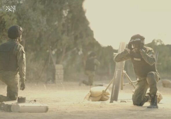 Israeli soldiers launch a mortar. Photo: Al Mayadeen.